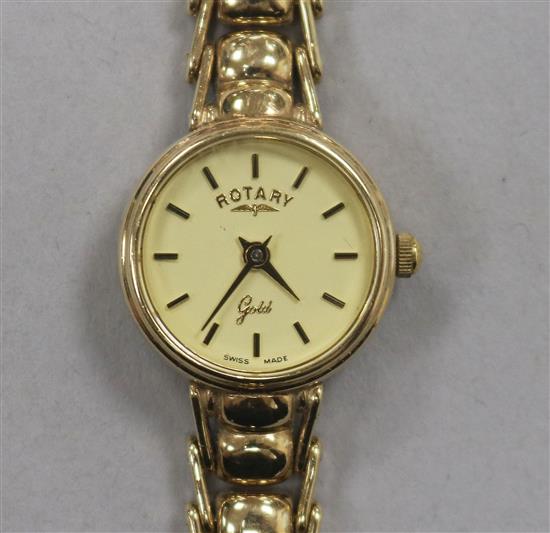 A ladys Rotary 9ct gold manual wind wrist watch, on a 9ct gold bracelet.